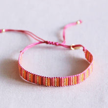Carica l'immagine nel visualizzatore di Gallery, Bracciale intrecciato a righe - rosa/arancione
